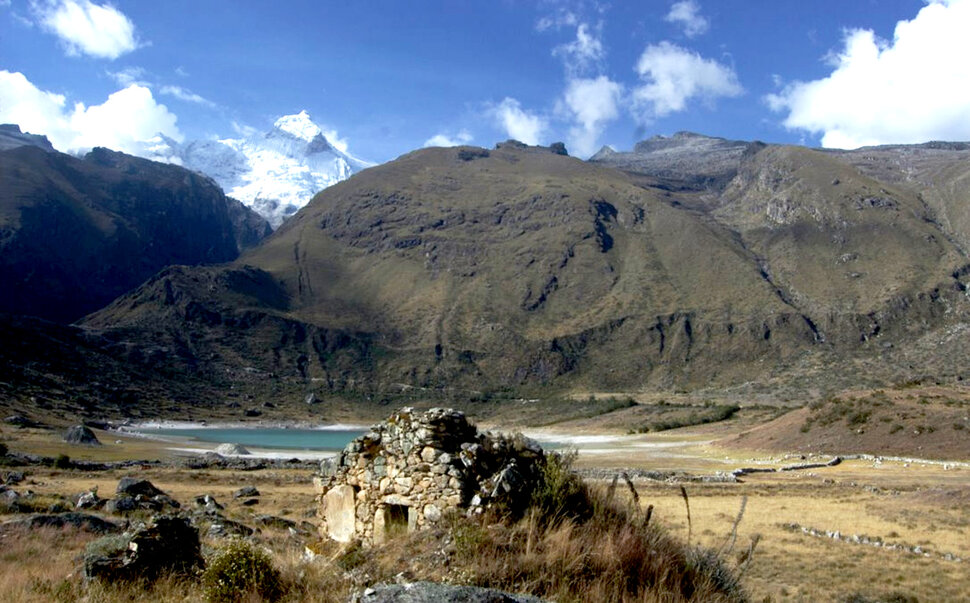 Landscape with mountains and a lake in the foreground