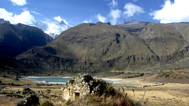 Landscape with mountains and a lake in the foreground